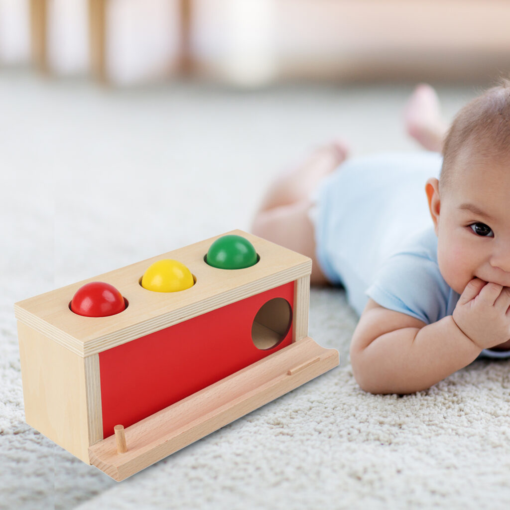 sweet little asian baby boy lying on floor