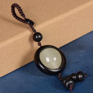 Porte clé en bois porte bonheur noir